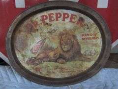 ***** DESCRIPTION UPDATE ***** (BIDDING RESTARTED ON THIS ITEM AT 5:00PM MT 11-11-24) 15" OVAL DR PEPPER LION TRAY - LOOKS TO BE OLD & ORGINAL, BUT IT COULD BE A REPRODUCTION.