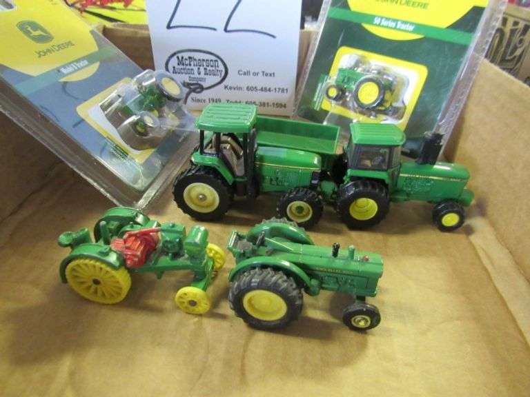 GROUP OF JD ITEMS INCLUDING MINATURE JD TRACTORS , QUILTING MATERIAL