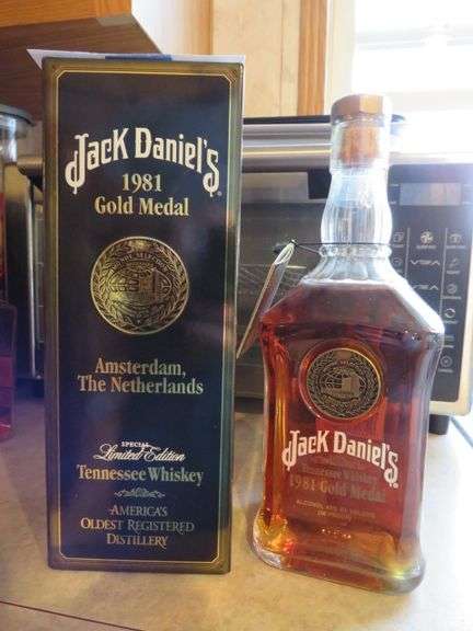 MUST BE 21 TO PURCHASE 1981 GOLD MEDAL AMSTREDAM BOTTLE OF JACK DANIELS