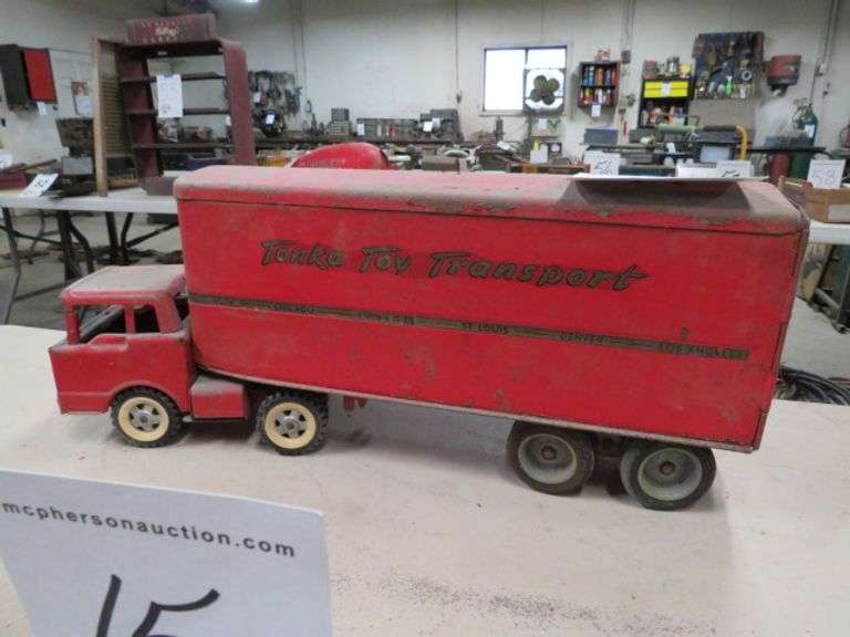TONKA TOY TRANSPORT TRUCK AND TRAILER, TRUCK DOES NOT MATCH THE TRAILER BUT THEY ARE BOTH OLD