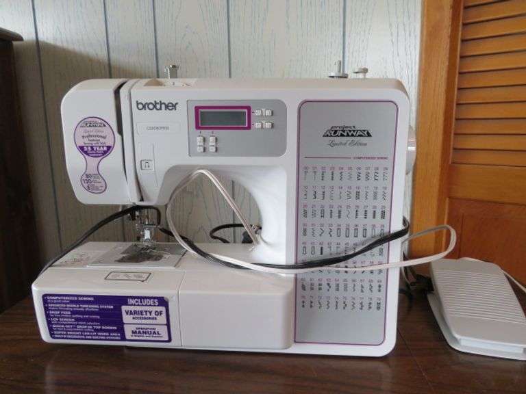 BROTHER PROJECT RUNWAY SEWING MACHINE AND CABINET WITH LOTS OF ...