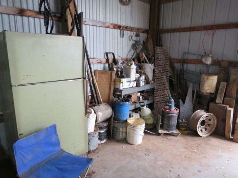 GROUP OF IRON AND SHOP MISC.INCLUDES OLDER REGRIGERATOR USED FOR STORAGE THIS IS THE  CATCH ALL CORNER IN THE NE CORNER OF THE GARRAGE NEAR THE HOUSE