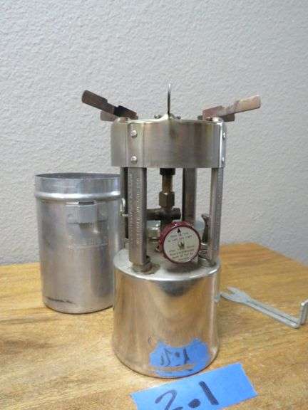 COLEMAN CAMP STOVE - W/ FUNNEL AND STORAGE CANISTER - EXCELELNT CONDITION