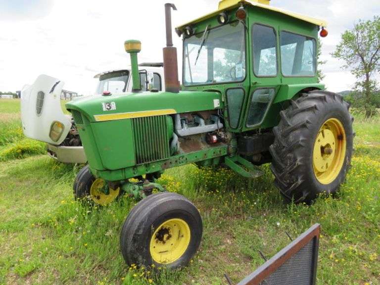 1960 John Deere 4020 Tractor - 3 point - cab - rear tires are fair to poor - tractor starts runs, operates and drives - diesel - solid ol JD 4020 2 wheel drive tractor - showing 2, 042 hrs