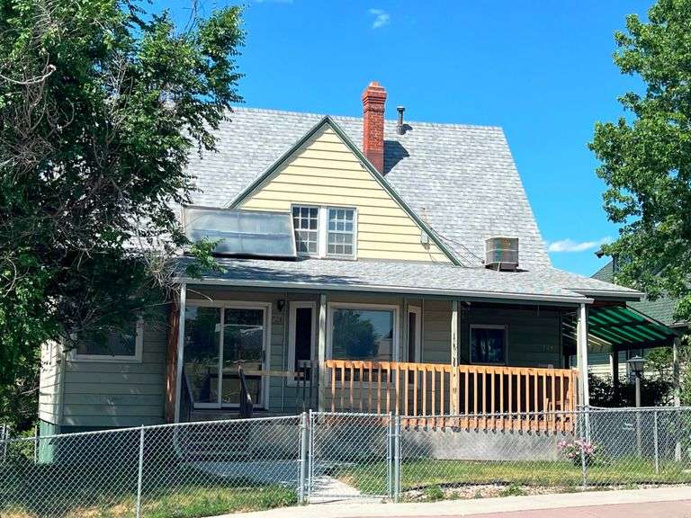 ABSOLUTE AUCTION MCKINNEY ESTATE - TRI-PLEX REAL ESTATE AUCTION - 728 SOUTH ST. RAPID CITY, SD