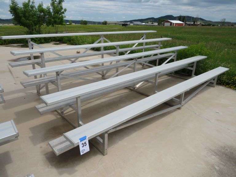 ALUMINUM 15' 5 ROW BLEACHER SECTION - VERY GOOD CONDITION - HAS SOME CASTERS STILL IN PLACE FOR MOVING