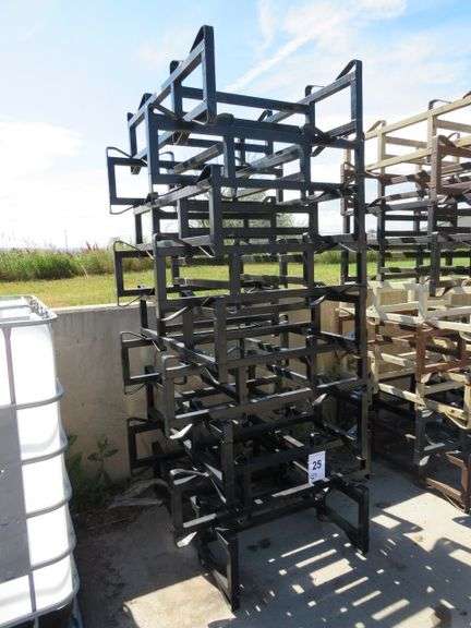 STEEL BARREL RACKS - FIT VARIOUS BARREL - THEY HAVE BEEN USING 55 GALLON WOOD BARRELS - ALL CLEAN AND READY TO USE - NO RIGGING OR LOADING FEE ON THESE - CRATE AND PALLET COSTS AS PER REQUEST - SELLING SO MUCH PER RACK X 9