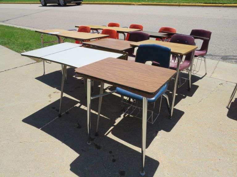 TEN SCHOOL DESKS W/ ORANGE, BLUE AND BURGUNDY CHAIRS
