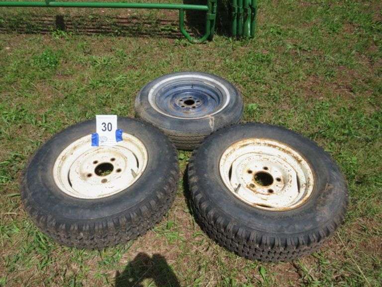 3 15" TRAILER TIRES AND RIMS 5 HOLE RIMS ALL TO GO ONE MONEY