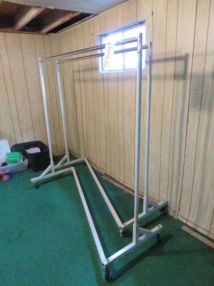 2 - ROLLING CLOTHES HANGING RACKS - McPherson Auction & Realty