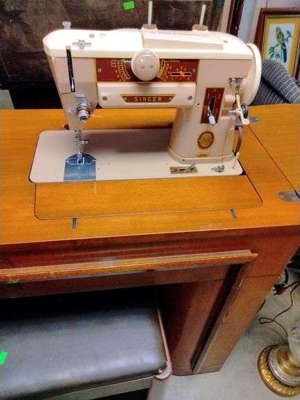 Sewing machine and bench - Metzger Property Services, LLC