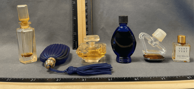 6 - Perfume Bottles Including Lancôme and “Vent Vert” Balmain, Paris