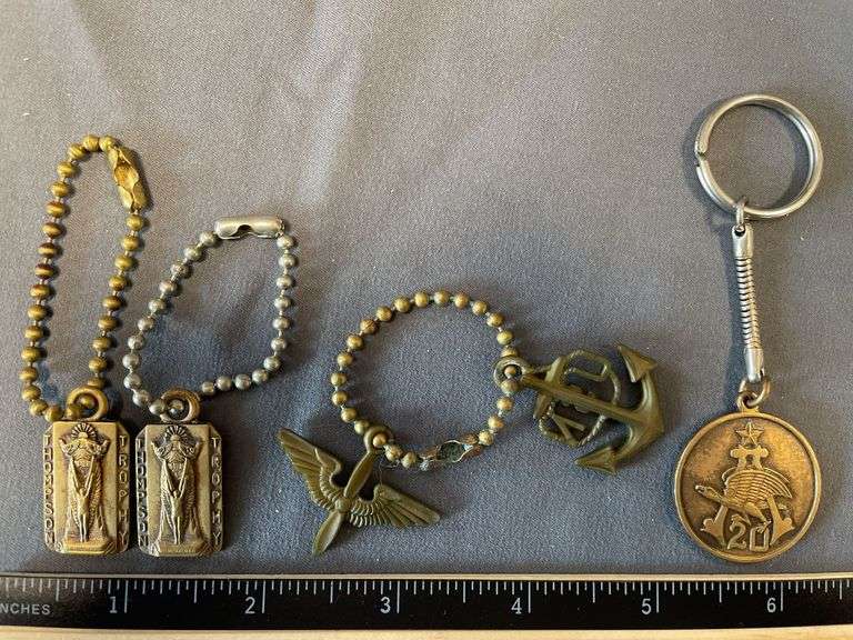 4 - Keychains Including 1970 Solid Brass Anheiser Busch 20,000,000 Bottle and Solid Brass Thompson Trophy