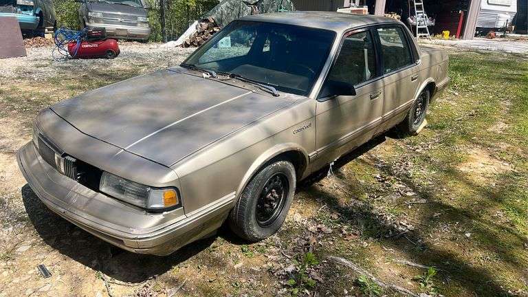 Cutlass Ciera S Four Door Sedan • Has Keys - Mileage 168,849 • Condition Unknown • Serial #1G3AG54N4P6435291 • $25.00 Administrative Fee to be added to Winning Invoice