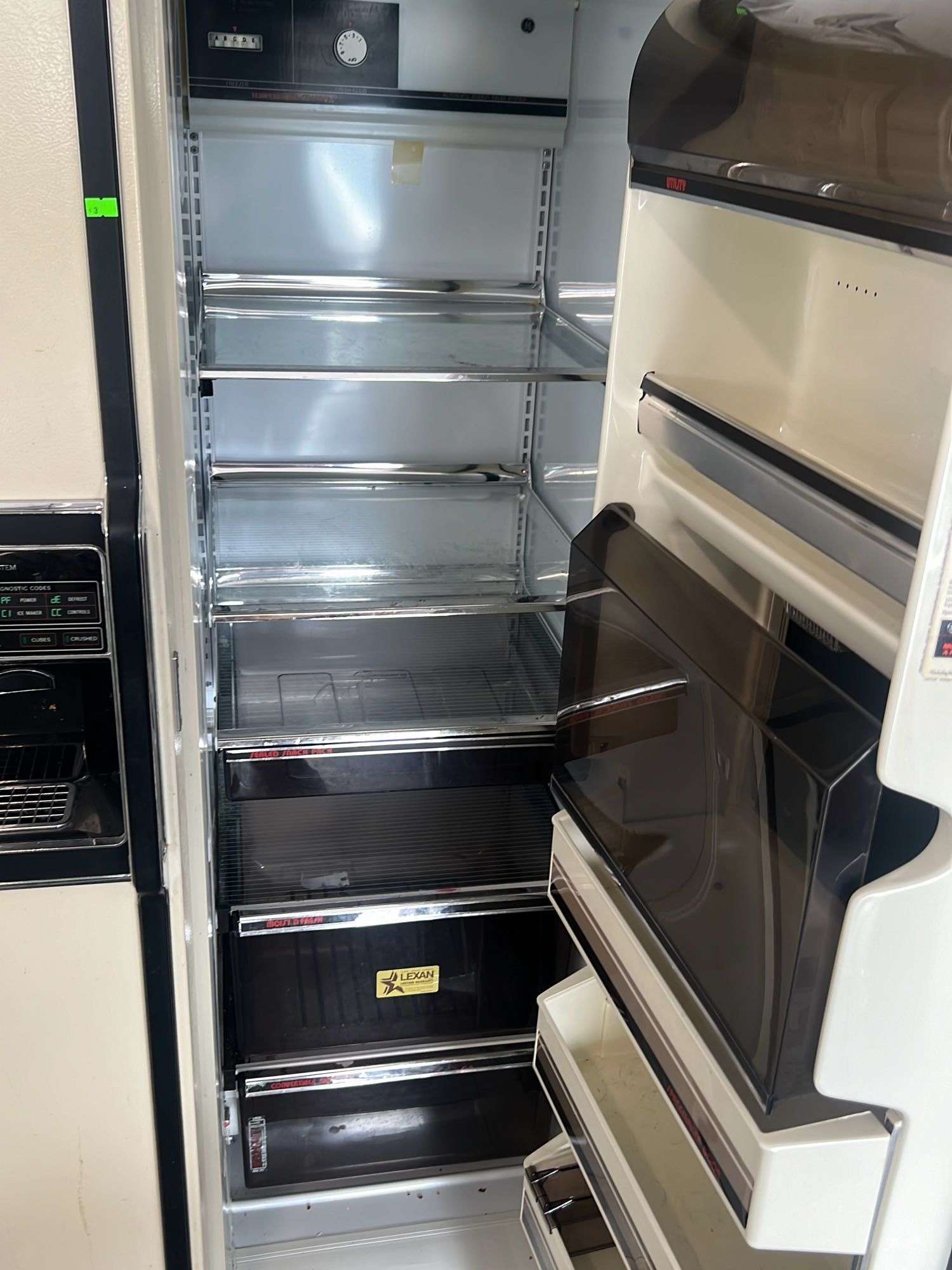 GE Side by Side Refrigerator/ Freezer, model TFX27F, works 32”x36