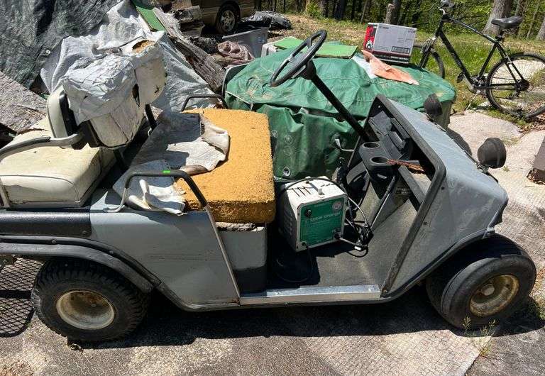 EZ-GO Four Seater Golf Cart Serial #502769 • Condition Unknown • Seats Torn • Has Rack