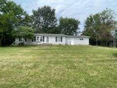 RANCH HOME WITH 2+CAR GARAGE on 1+ACRES!