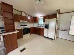 RANCH HOME WITH 2+CAR GARAGE on 1+ACRES!