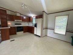 RANCH HOME WITH 2+CAR GARAGE on 1+ACRES!