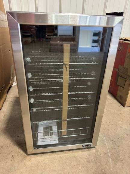 Newair 126 can freestanding beverage cooler, has break in glass on inside