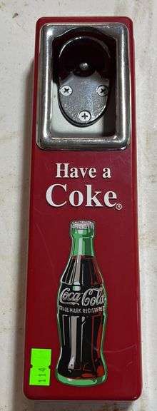 Have a Coke bottle opener , cap catch