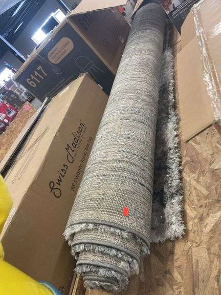 Area Rug Approx. 66” - Metzger Property Services, LLC
