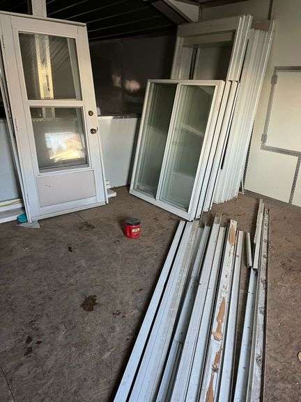Patio enclosure inc. 6 window frames 4’ x80”, 2@ 44.5”x 86”, 2 doors frames 38”x86”, 2 doors left and right that fit in frames, 8 windows made to fit frames and trim