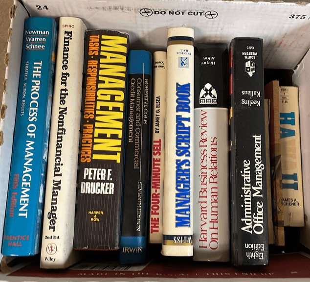 Stack Of Management Books Book assortment including business & management books - Metzger ...