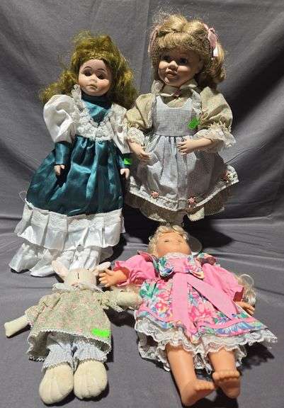 (2) Porcelain Dolls 15", (1) Hand Made Cloth Rabbit Doll 8", (1) Plastic Doll 11"