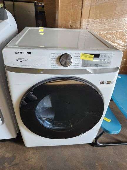 Samsung 7.5 cu. ft. Vented Smart Stackable Electric Dryer in White with Steam Sanitize+ model# DVE45B6300W has scuffing
