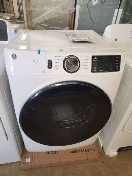GE 7.8 cu. ft. Smart Front Load Electric Dryer in White with Sanitize Cycle, ENERGY STAR model # GFD55ESSN3WW Dented on top left corner sold as is