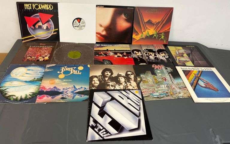 Collection of Various Vinyl Records Featuring Rock and Pop Artists ...