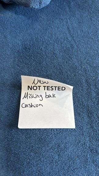 Navy sofa missing back cushion sold as is