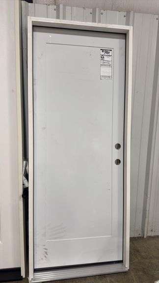 Primed pre hung left hand in swing door 32”x80” some scuffs