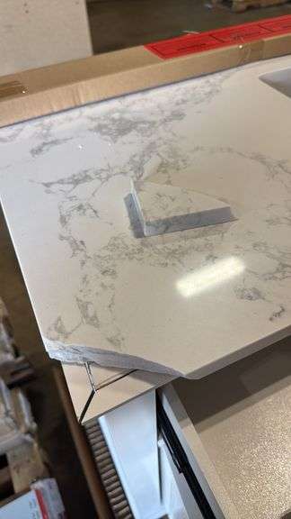 Home Decorators Collection
Doveton 48 in. Single Sink Freestanding White Bath Vanity with White Engineered Marble Top top is broken