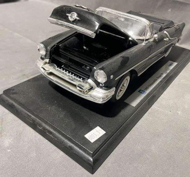 1955 Oldsmobile Super 88 Convertible Diecast Model on Display Base