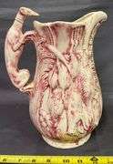 Pitcher with Game Motif and Hound Handle – has been repaired on the spout 10”