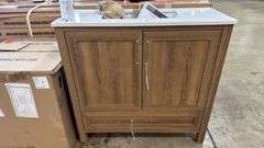 Home Decorators Collection
Moorside 36 in. Single Sink Sweet Maple Bath Vanity with White Engineered Stone Top has cracked top