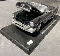 1955 Oldsmobile Super 88 Convertible Diecast Model on Display Base