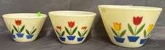 Three Fire-King Oven Ware Mixing Bowls with Tulip Motif