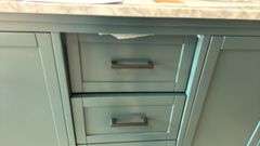 Home Decorators Collection
Merryfield 61 in. Double Sink Antigua Green Bath Vanity with White Carrara Marble Top top drawer does not open and has damaged back