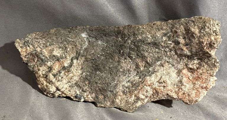 Rough Mineral Specimen with Metallic Inclusions