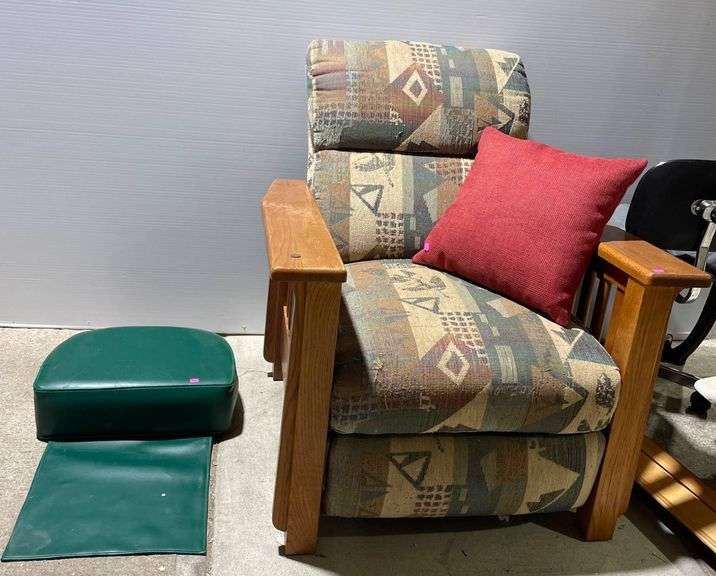 Upholstered Recliner & Barbers Booster Seat for a Child