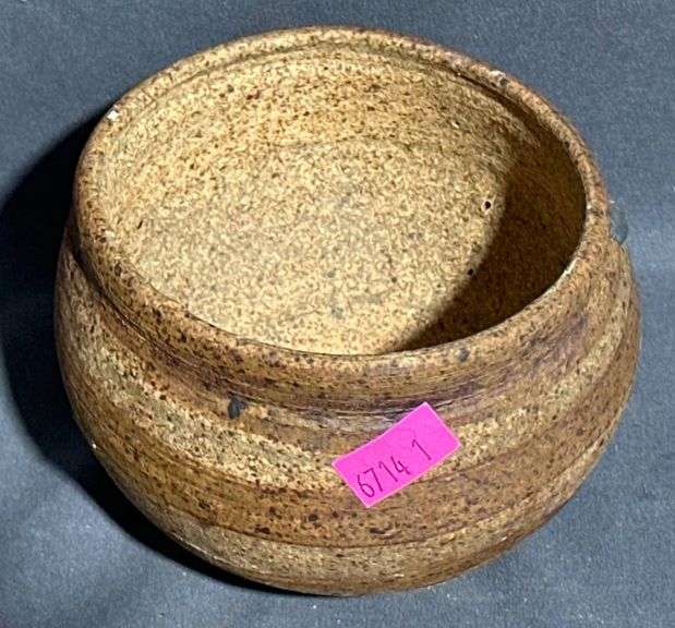 Handcrafted Planter with Textured Surface and Marked Base