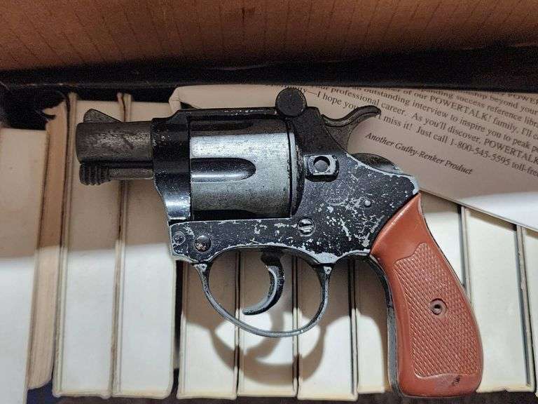 Hardcover and Paperback Books with Marx Toy Cap Gun