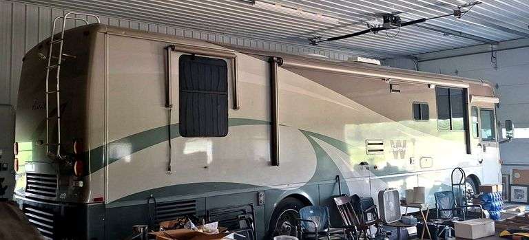 2005 Winnebago Journey 36G Class A Motorhome with Slide-Outs, 350 CAT Diesel, 54k miles, Runs & Drives, new battery, has title, VIN 4UZAAHDC85CU36150 - A $25 TITLE FEE WILL BE ADDED TO THE WINNING INVOICE