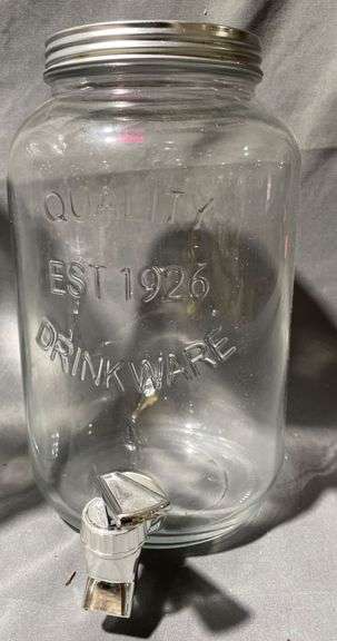 Two Clear Glass Beverage Dispensers with Spigots and Lids