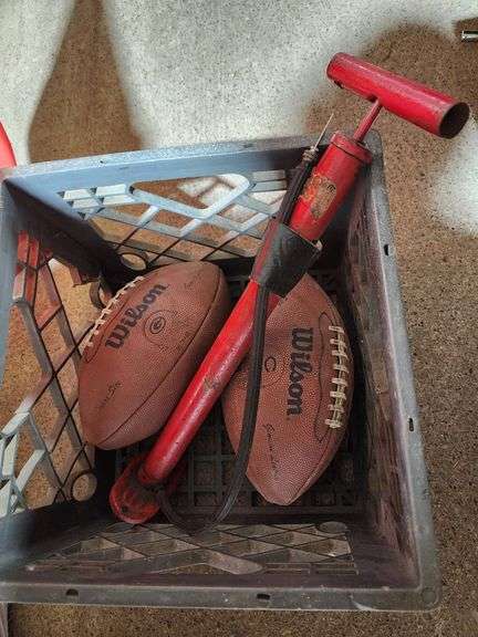 Sports Items Including Wilson Footballs, Air Pump, Flags, and Banners