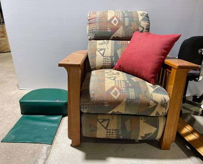 Upholstered Recliner & Barbers Booster Seat for a Child