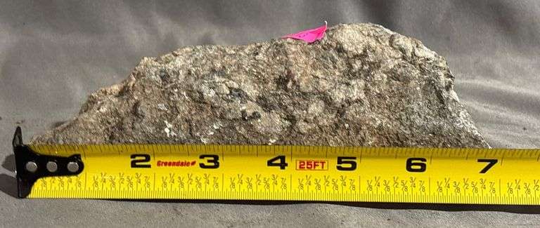 Rough Mineral Specimen with Metallic Inclusions